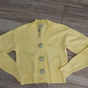 ANNE FERNANDES..CROP CARDI